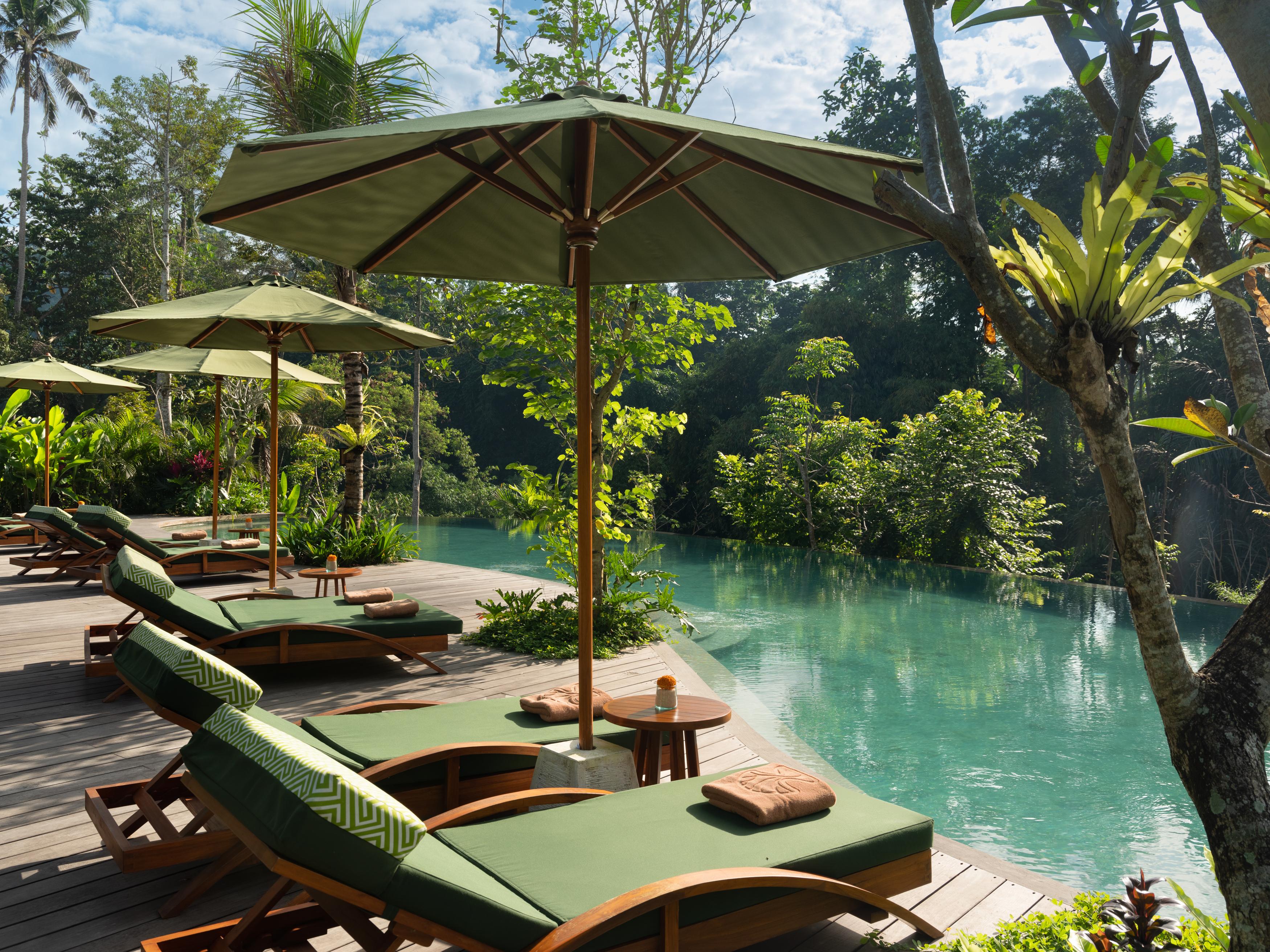 Hotel Adiwana Suweta Ubud Esterno foto The resort's swimming pool