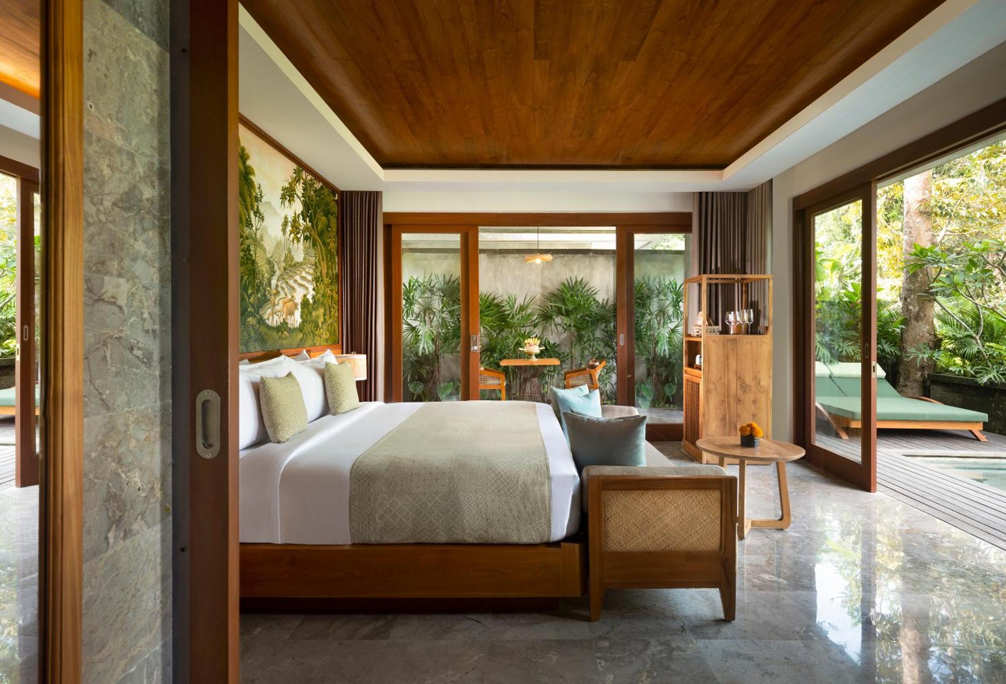 Hotel Adiwana Suweta Ubud Esterno foto A bedroom at the hotel