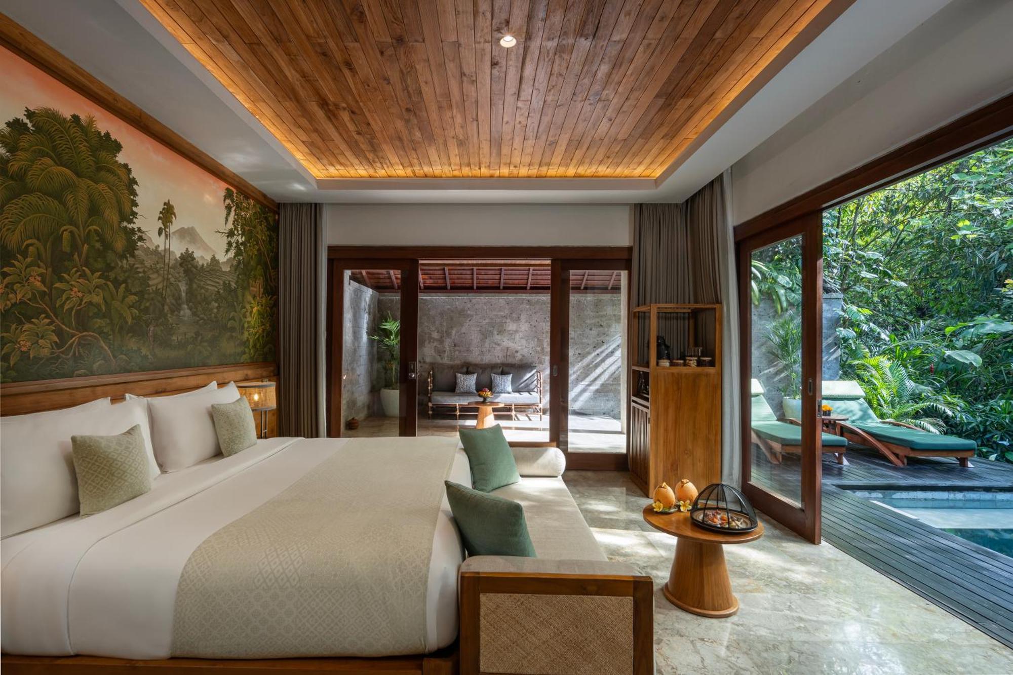Hotel Adiwana Suweta Ubud Esterno foto A bedroom at the hotel
